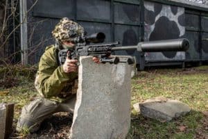 Military sniper with high-precision PGM Ultima Ratio rifle