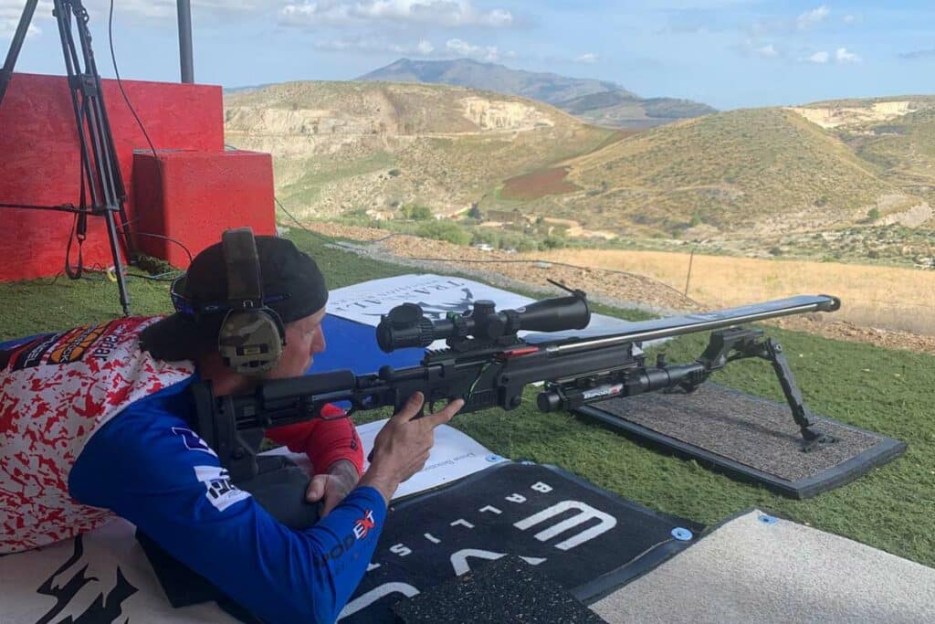 Jordan on the firing line at Extreme Shot Italia with PGM Mini Hécate II Custom rifles in .338 LM caliber and a Schmidt & Bender 6-36x56 PM II rifle scope.